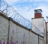 Jail wall with barbwire