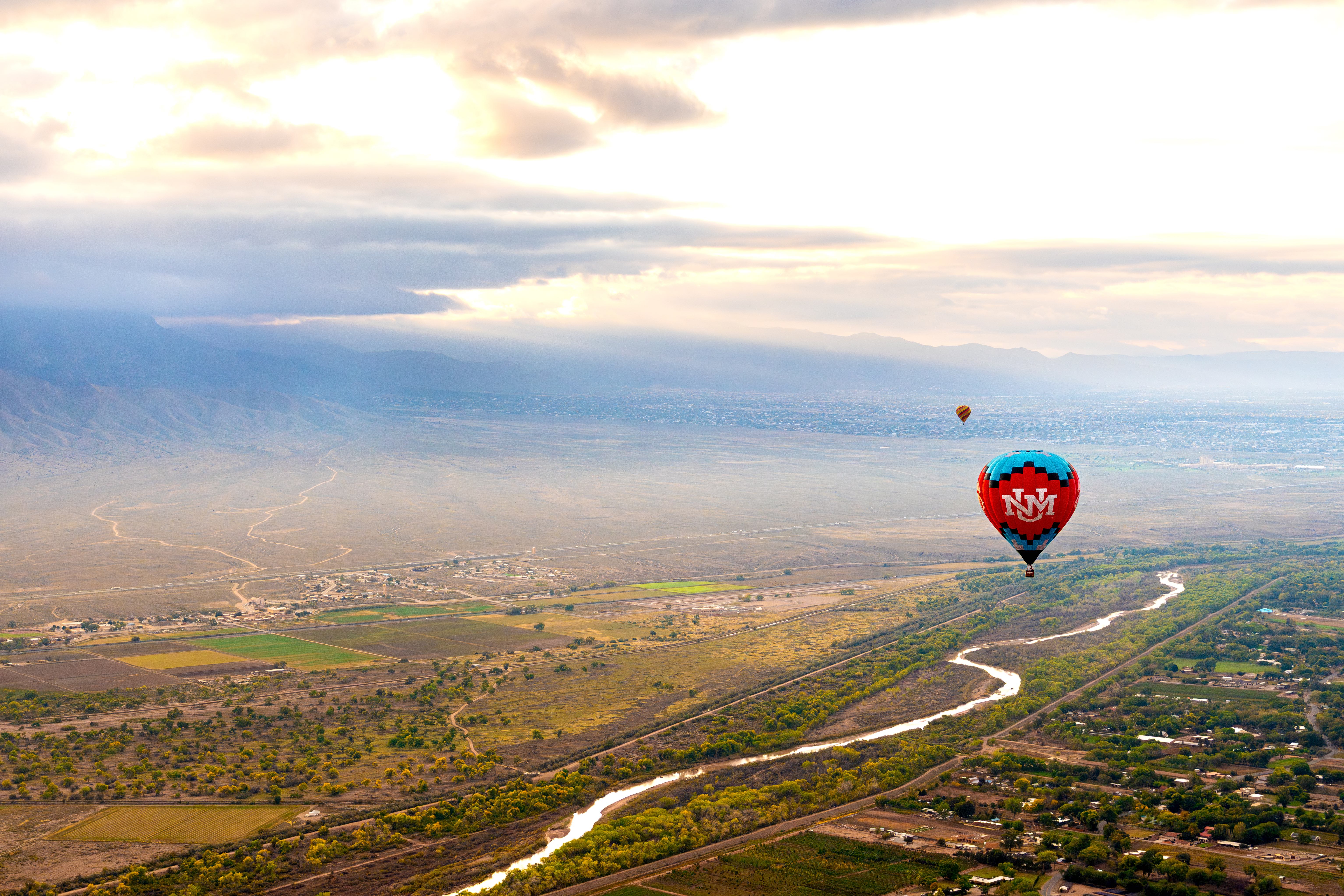 UNM hot air balloon above Rio Grande